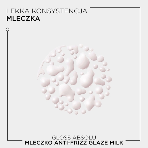 Zbliżenie na lekką, mleczną konsystencję Kérastase Gloss Absolu Anti-Frizz Glaze Milk, podkreślające jedwabistą formułę produktu.