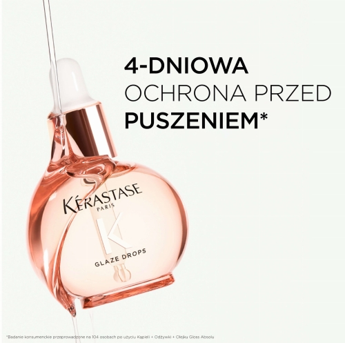 Olejek Kérastase Gloss Absolu Glaze Drops spływający z buteleczki, podkreślający jego lekką formułę.