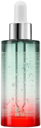 Tył butelki serum Kérastase Genesis Homme – etykieta i skład produktu.