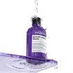 Keratin Alpha Sleek szampon 300 ml butelka pod strumieniem wody